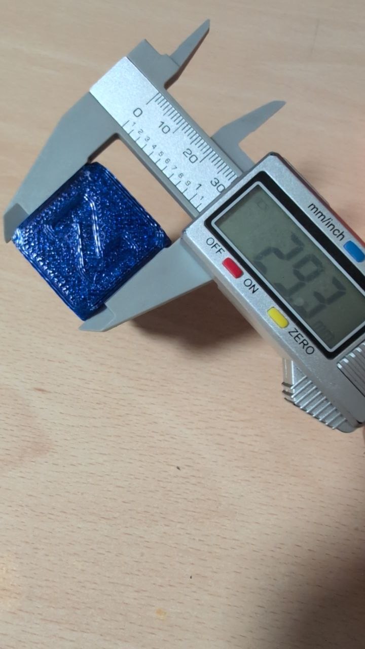 Calibration cube measuring 29.33mm with digital caliper