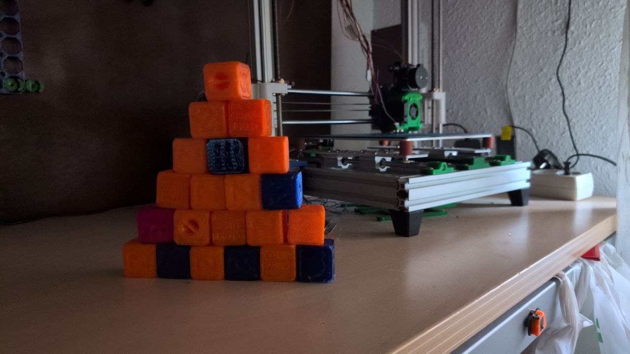 Tower of 21 calibration cubes in different colors
